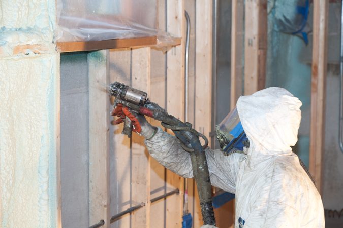 Closed-cell spray foam filling a wall cavity